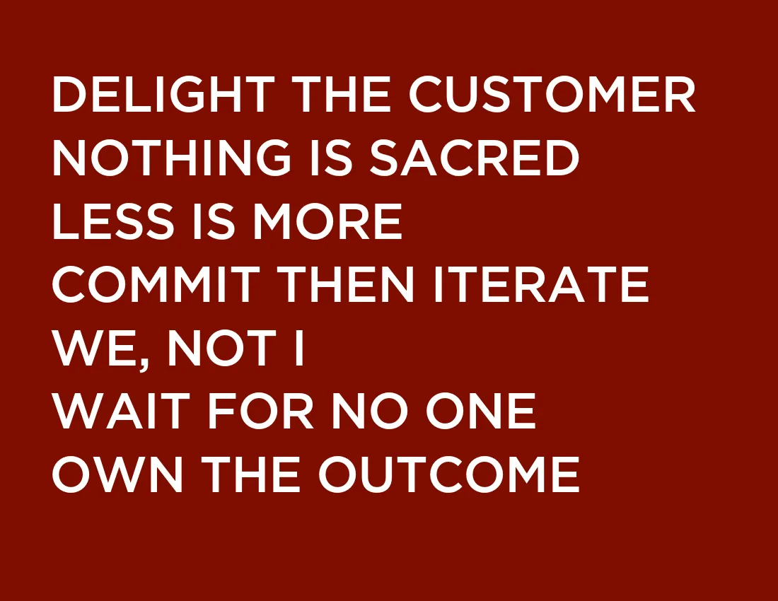 The seven rules poster: Delight the Customer, Nothing is Sacred, Less is More, Commit then Iterate, We Not I, Wait for No One, Own the Outcome